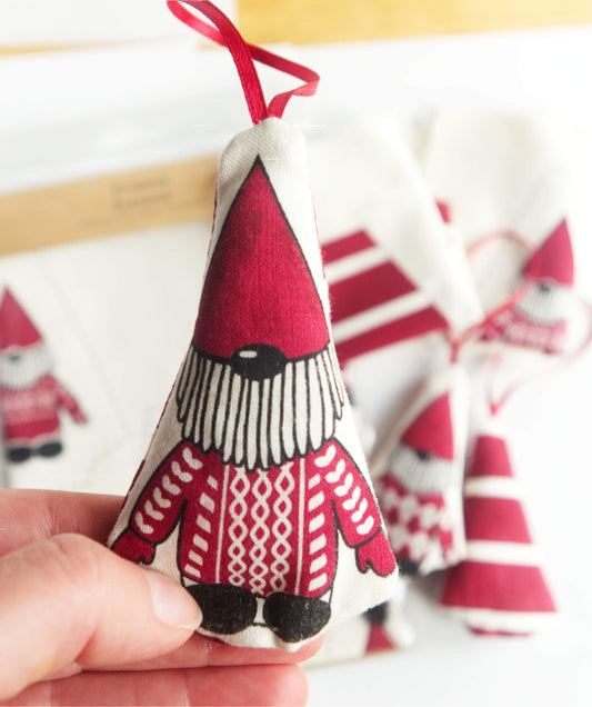 gnome ornament in a hand 