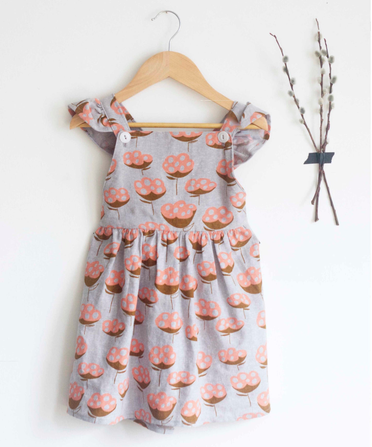 pinafore dress pattern on hanger
