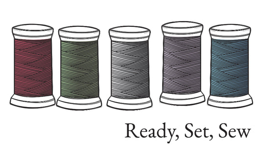 drawing of spools of thread on gift card